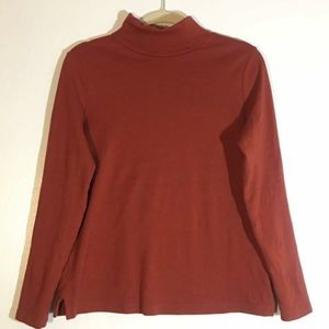 Burgundy hi-neck sweater.